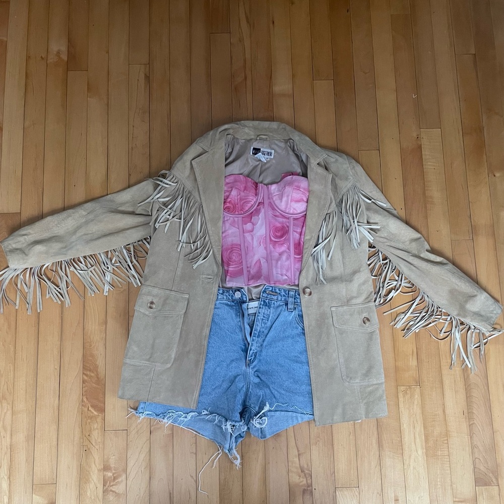 Beige suede vintage jacket.